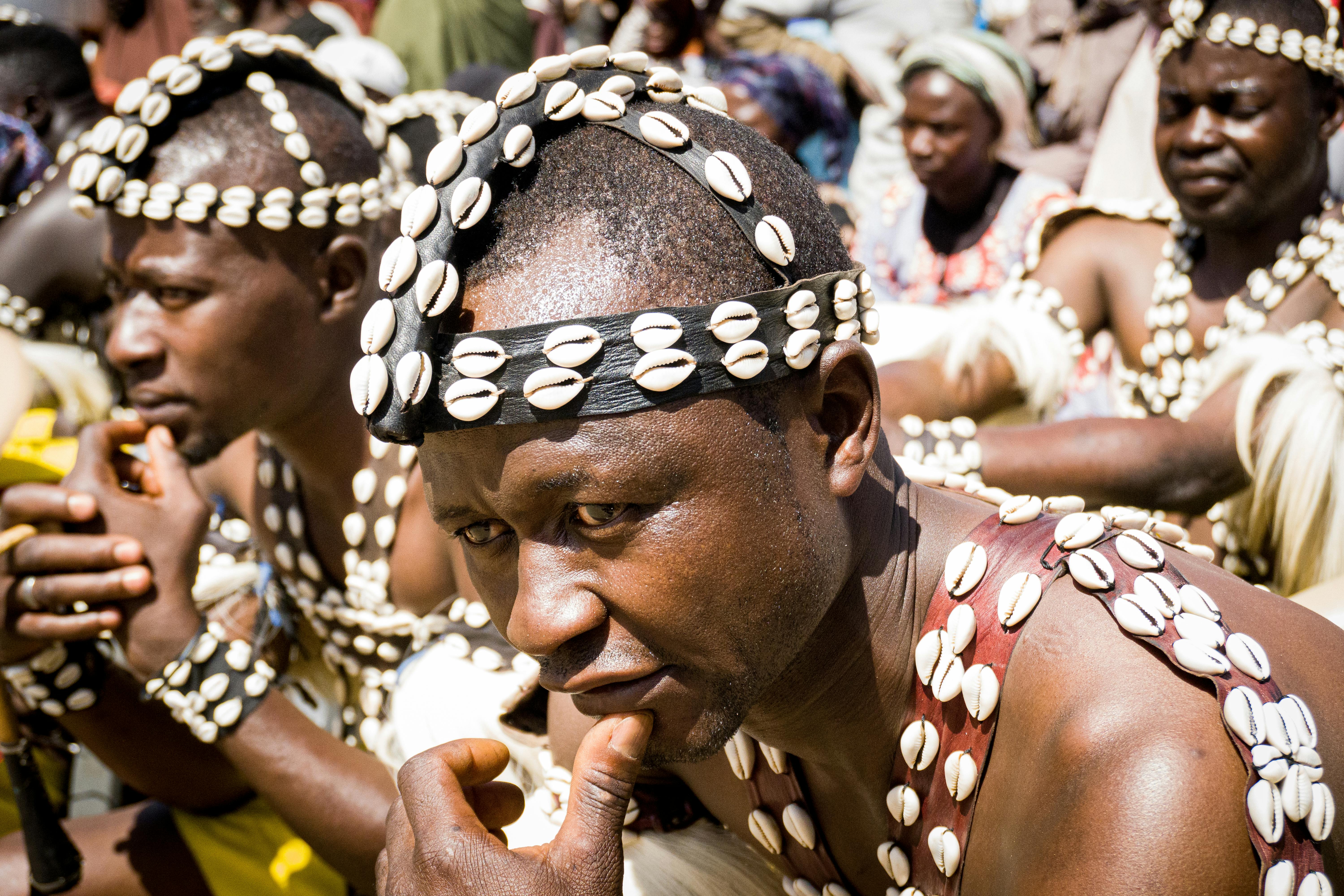 Nigerian dancer in cowrie shell traditional attire