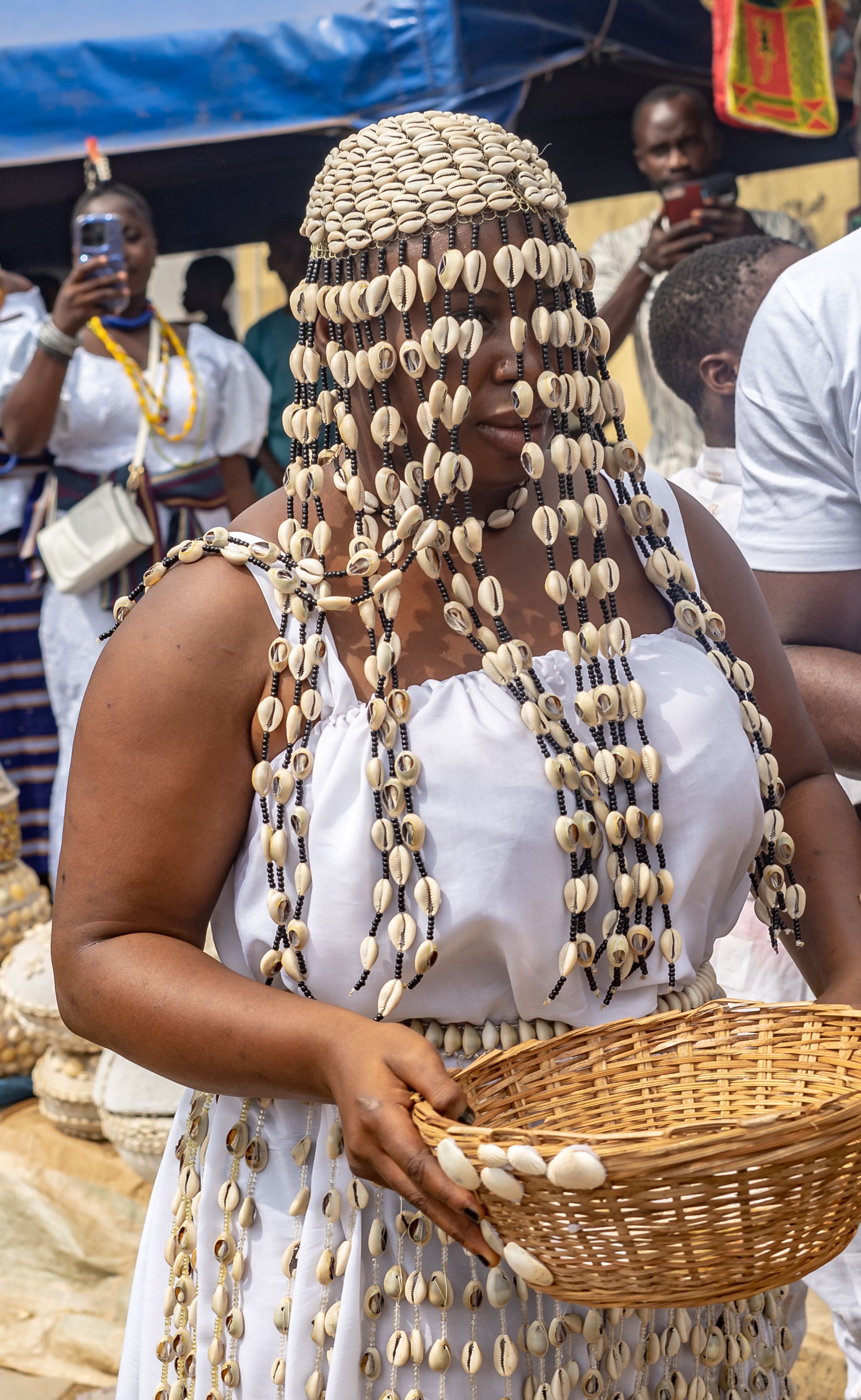 Yoruba woman draped in cowrie shells, Osogbo festival, Nigeria